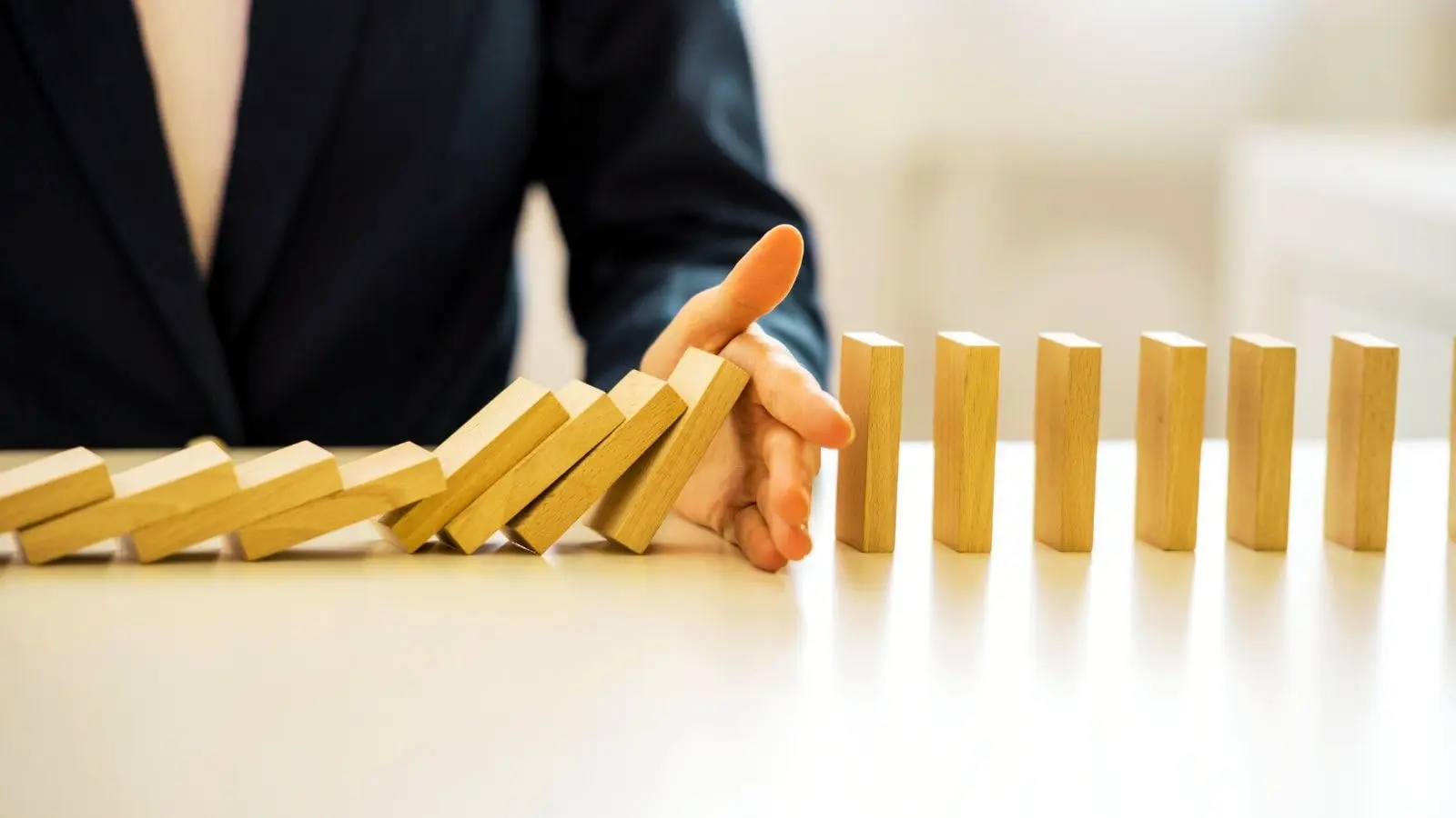 Stopping Dominoes From Falling